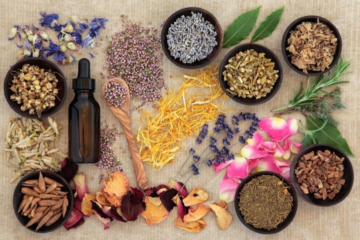 different types of spices flowers apothecary bottle flatlay 